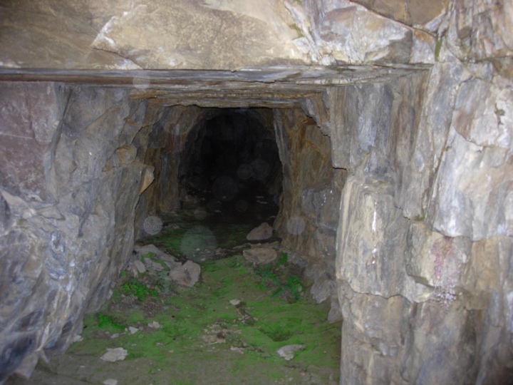 A cave with a tunnel

Description automatically generated with medium confidence