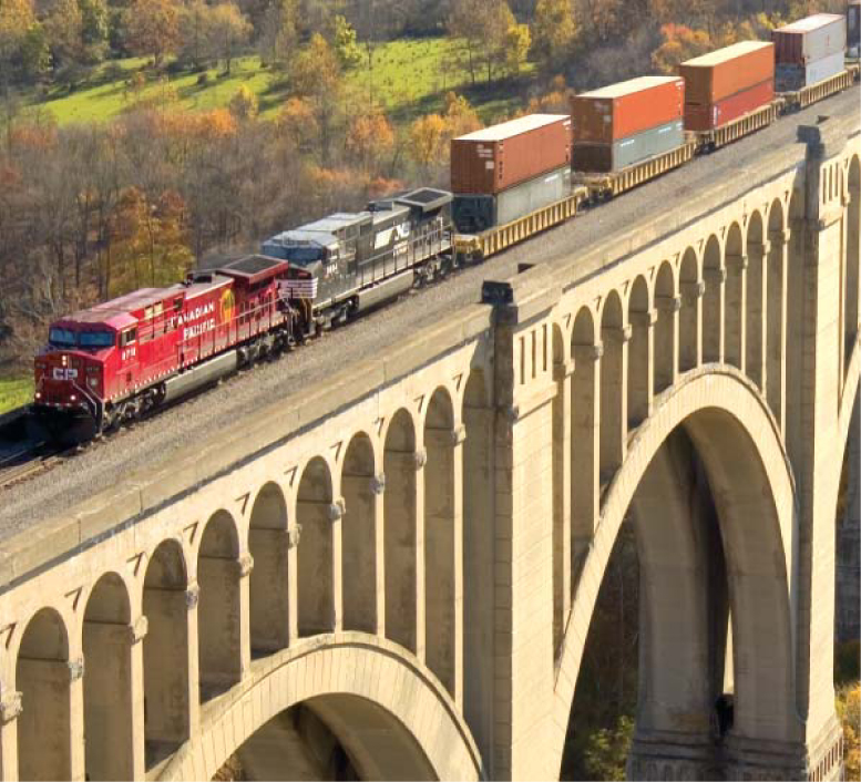 (PHOTO OF TRAIN OVER BRIDGE)