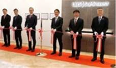 A group of men in suits standing on a red carpet

Description automatically generated with medium confidence