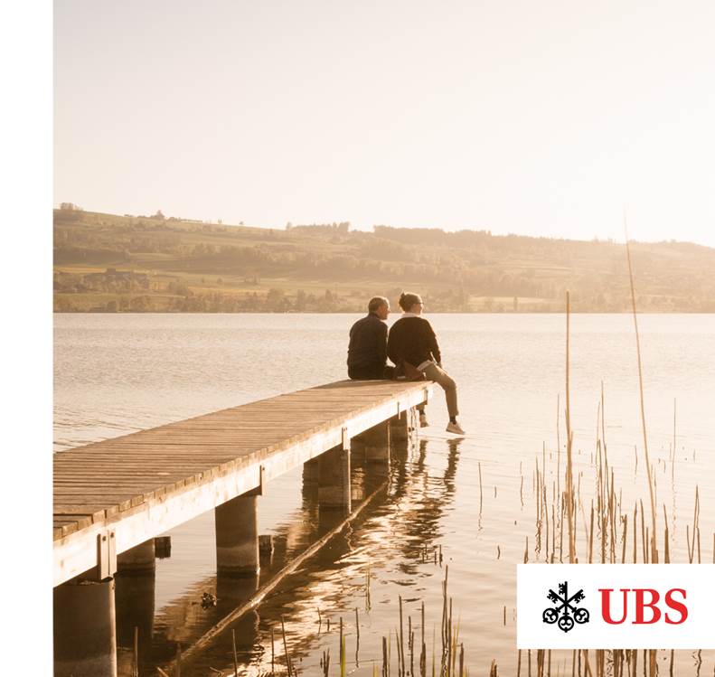 A couple sitting on a dock

Description automatically generated with medium confidence